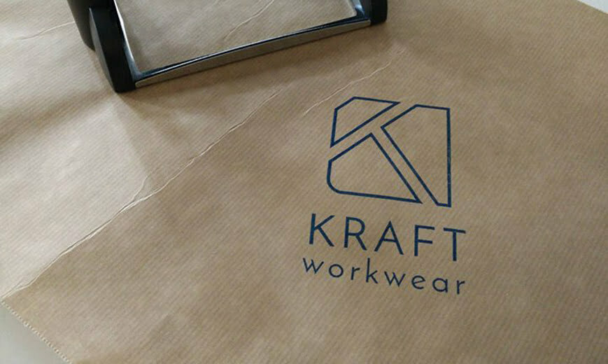 Une photo du logo de Kraft Workwear, le spécialiste en vêtement de travail de qualité
